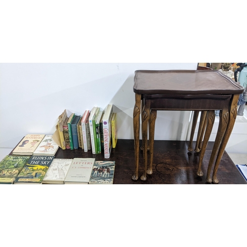 10 - A mixed lot to include a mahogany nest of three tables, and a collection of fiction and non-fiction ... 