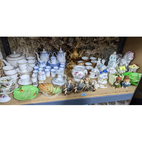 106 - A mixed lot of ceramics to include a Grafton china coffee set, Coalport figure and various pastel bu... 