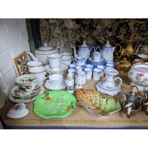 106 - A mixed lot of ceramics to include a Grafton china coffee set, Coalport figure and various pastel bu... 