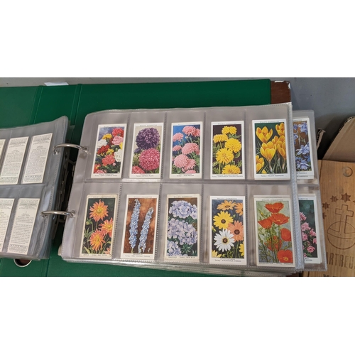 113 - A selection of collectors cards, some in books, others in albums, to include Hints on Association Fo... 