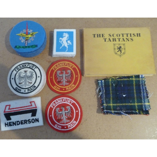 124 - Mainly New Old stock Cloth Golf Badges with manufactures order forms and sample examples for assorte... 