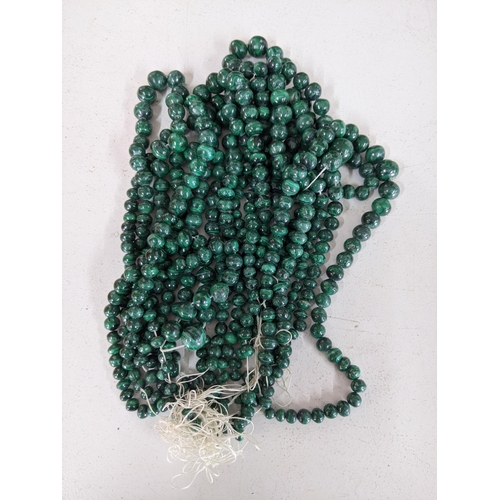 131 - A collection of malachite necklaces consisting of polished beads 889.5g
Location:1.2
If there is no ... 