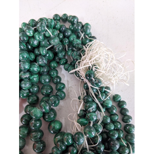 131 - A collection of malachite necklaces consisting of polished beads 889.5g
Location:1.2
If there is no ... 