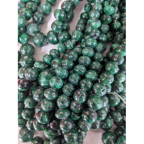 131 - A collection of malachite necklaces consisting of polished beads 889.5g
Location:1.2
If there is no ... 