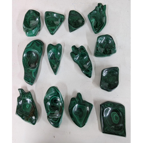 132 - Thirteen pieces of malachite in various forms, some used as small bowls and ashtrays
Location:1.4
If... 