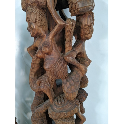 134 - Three African style tribal wooden carving figure statues, largest 63cmh, smallest 55cmh
Location:RAM... 