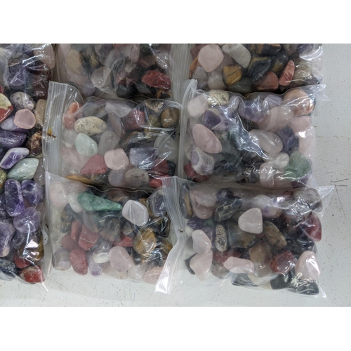 136 - Fourteen bags of semi precious stones to include tiger eye, aquamarines and others
Location:A1M
If t... 