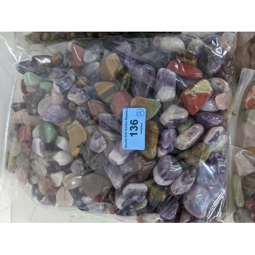 136 - Fourteen bags of semi precious stones to include tiger eye, aquamarines and others
Location:A1M
If t... 