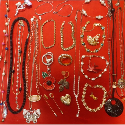 114 - A large quantity of modern fashion jewellery to include gold tone chains, a Trifari gold tone heart ... 