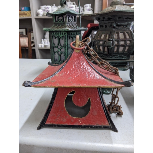 146 - Ten Oriental style lanterns to include a pair with red tops and glass bottoms, another smaller one w... 