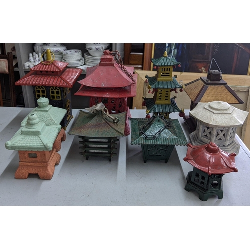 147 - Ten Oriental style lanterns to include a terracotta coloured pair with light green tops, one fashion... 