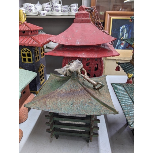 147 - Ten Oriental style lanterns to include a terracotta coloured pair with light green tops, one fashion... 