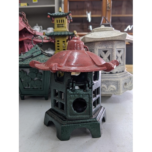 147 - Ten Oriental style lanterns to include a terracotta coloured pair with light green tops, one fashion... 