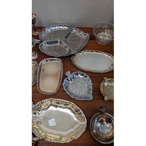 185 - A collection of silver plate to include trays, dishes, goblets, souvenir spoons and other items
Loca... 