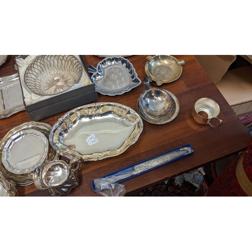 185 - A collection of silver plate to include trays, dishes, goblets, souvenir spoons and other items
Loca... 