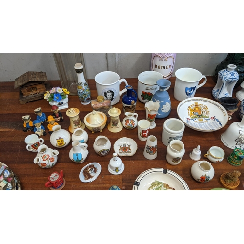 193 - Collectable ceramic and glassware to include miniature Crestware urns, miniature figures, a Taylor  ... 