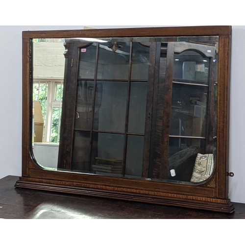 2 - An Edwardian mahogany mantel mirror 96cm x 70.5cm Location:A1F
If there is no condition report shown... 