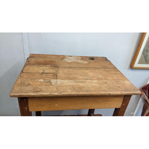 21 - An early 20th century school desk with hinged top
Location:A3M
If there is no condition report shown... 