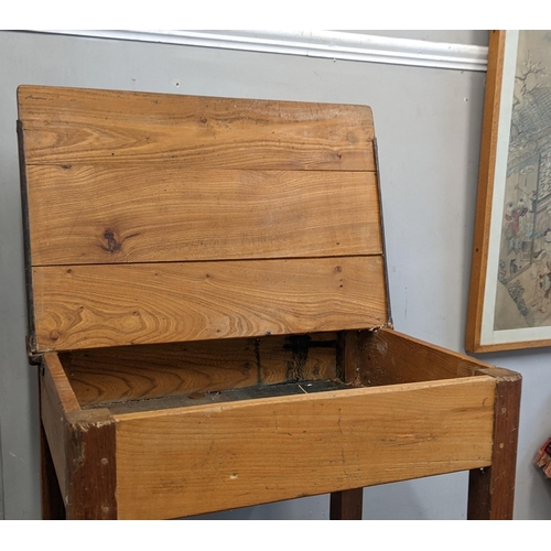 21 - An early 20th century school desk with hinged top
Location:A3M
If there is no condition report shown... 