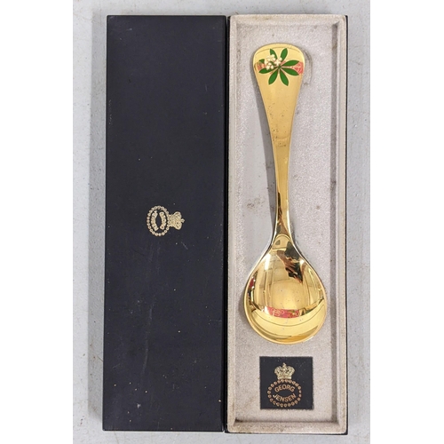 212 - A boxed Georg Jensen silver gilt 1975 spoon, designed by Rigmor Anderson and Annelise Bjorner, 45.8g... 