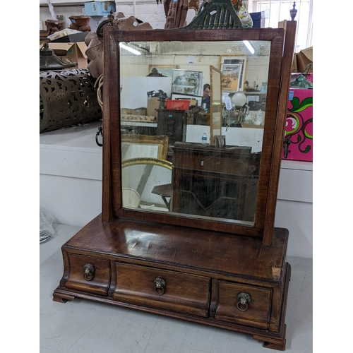 225 - A 19th century dressing table swing mirror with lion ring mask handles and bracket shaped feet, 61.5... 