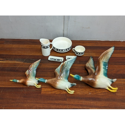 24 - Three Bretby porcelain flying ducks and a children's black and white dinner service
Location:1.4
If ... 