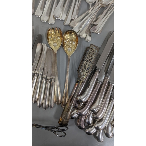 241 - A quantity of various silver plated flatware and cutlery along with asparagus servers and other item... 