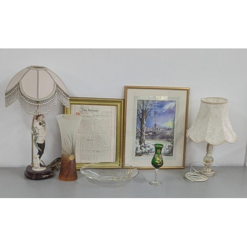 243 - A mixed lot to include a framed and glazed indenture, glassware and two lamps to include a figural t... 