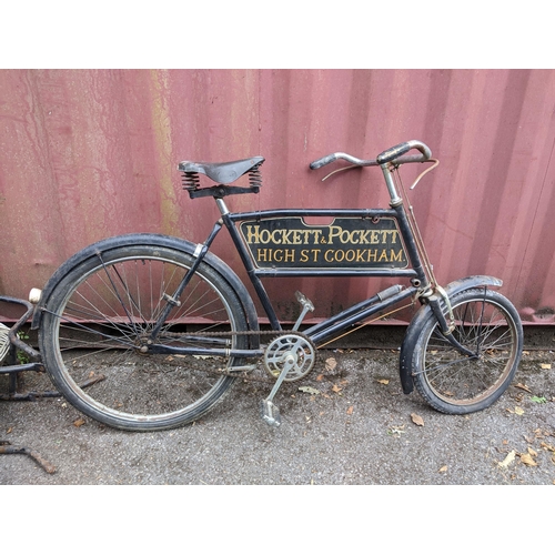 250 - A vintage Butcher's bicycle, black painted frame, with advertising sign for Hocket and Pocket High S... 