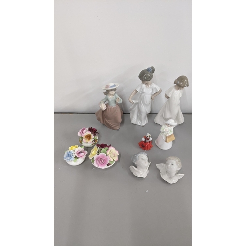 266 - A mixed lot to include two Royal Doulton figures, two Lladro cherubs and three Lladro Nao figures, v... 