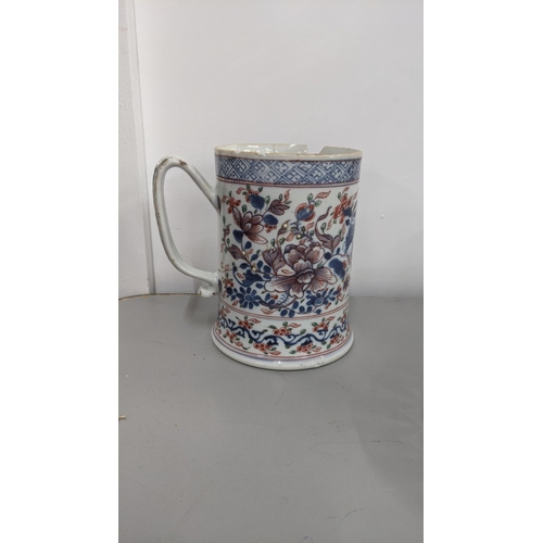 272 - An 18th century Chinese clobbered tankard decorated with a floral design, A/F
Location: 4-1
If there... 