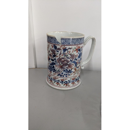 272 - An 18th century Chinese clobbered tankard decorated with a floral design, A/F
Location: 4-1
If there... 