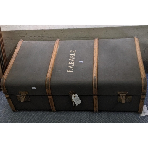 281 - An early 20th century Canvas bound trunk with bent wood supports inscribed to the lid P.A. Earle 90c... 