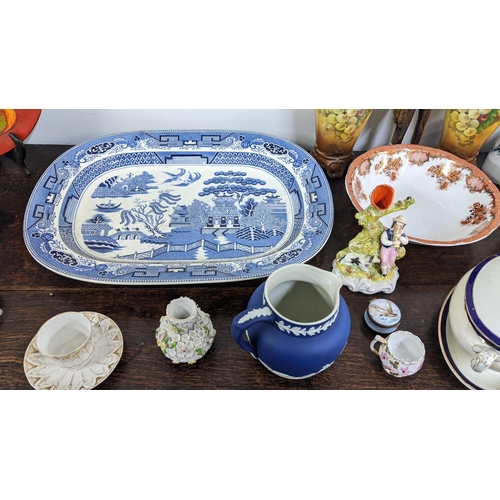 3 - A mixed lot to include a Poole pottery plate, a pair of Austrian decorative jugs, a treen carving of... 