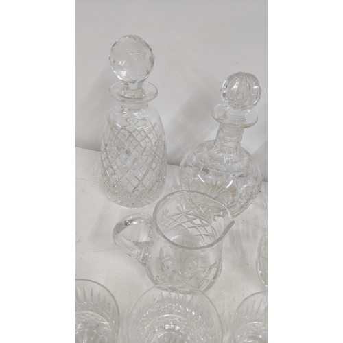 304 - Early 20th century and later glassware to include a pair of crystal cut glass decanters together wit... 