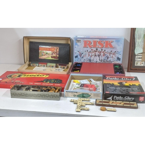 313 - A group of vintage board games to include Cluedo by John Waddington and others together with wood an... 