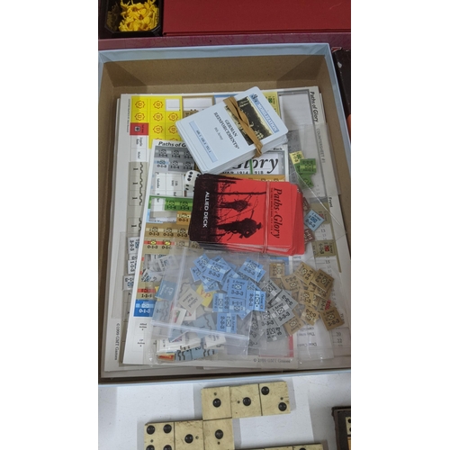 313 - A group of vintage board games to include Cluedo by John Waddington and others together with wood an... 