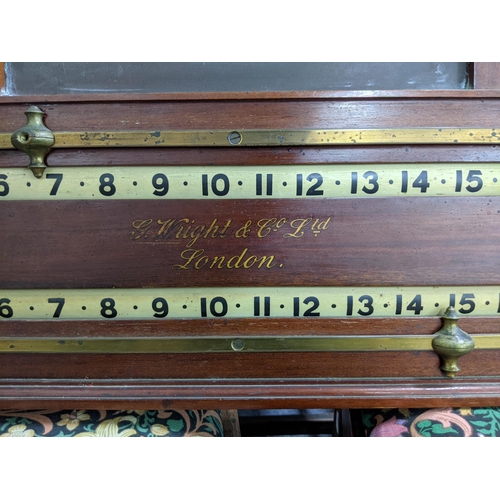 33 - An Edwardian or late Victorian Billiard scoreboard by George Wright & Co, London with a slate panell... 