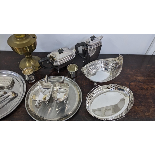 4 - A mixed lot of metalware to include mostly silver plate trays, a sugar pot, milk jug, a hallmarked s... 