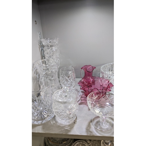 6 - A mixed lot of glassware to include crystal glass bowls, decanter vinegar jugs together with a decor... 