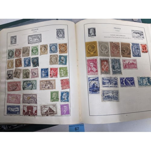 67 - A collection of world stamps and coins, held mainly in three albums, to include GB and Italy stamps ... 