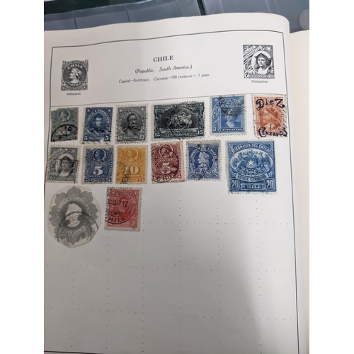 67 - A collection of world stamps and coins, held mainly in three albums, to include GB and Italy stamps ... 