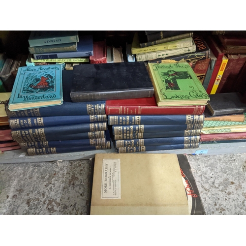 71 - A quantity of books to include early edition of Through the Looking Glass and Alice's Adventures in ... 