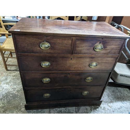 78 - A Georgian mahogany flat fronted chest of two short and three long graduated drawers on plinth base ... 