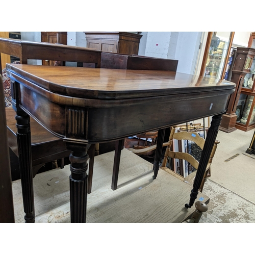 79 - Small furniture to include a Victorian mahogany fold over and swivel topped card table, on turned, t... 