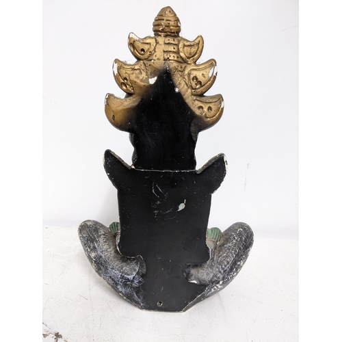 86 - A painted plaster Air India table lamp in the form of a seated Thai woman A/F Location:G
If there is... 