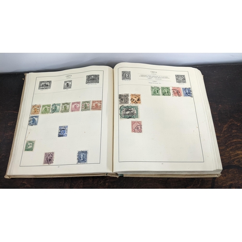 9 - A stamp album containing stamps from around the world to include China, Mexico, Italy, USA and other... 