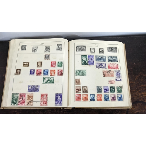 9 - A stamp album containing stamps from around the world to include China, Mexico, Italy, USA and other... 