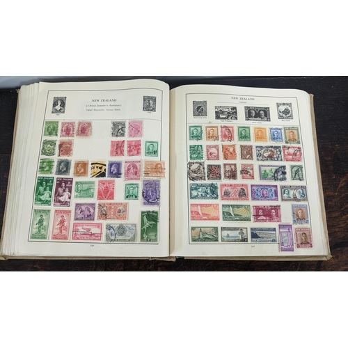 9 - A stamp album containing stamps from around the world to include China, Mexico, Italy, USA and other... 