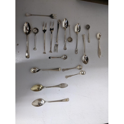 91 - A selection of Victorian and later salt, mustard, coffee and souvenir spoons, forks and other items ... 